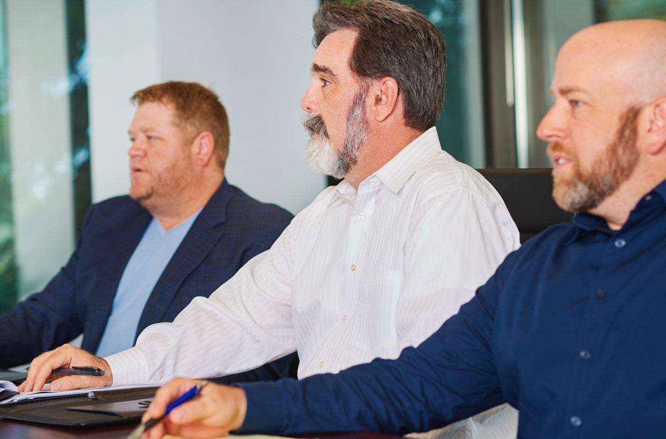 Three Cukierski team members attending a meeting